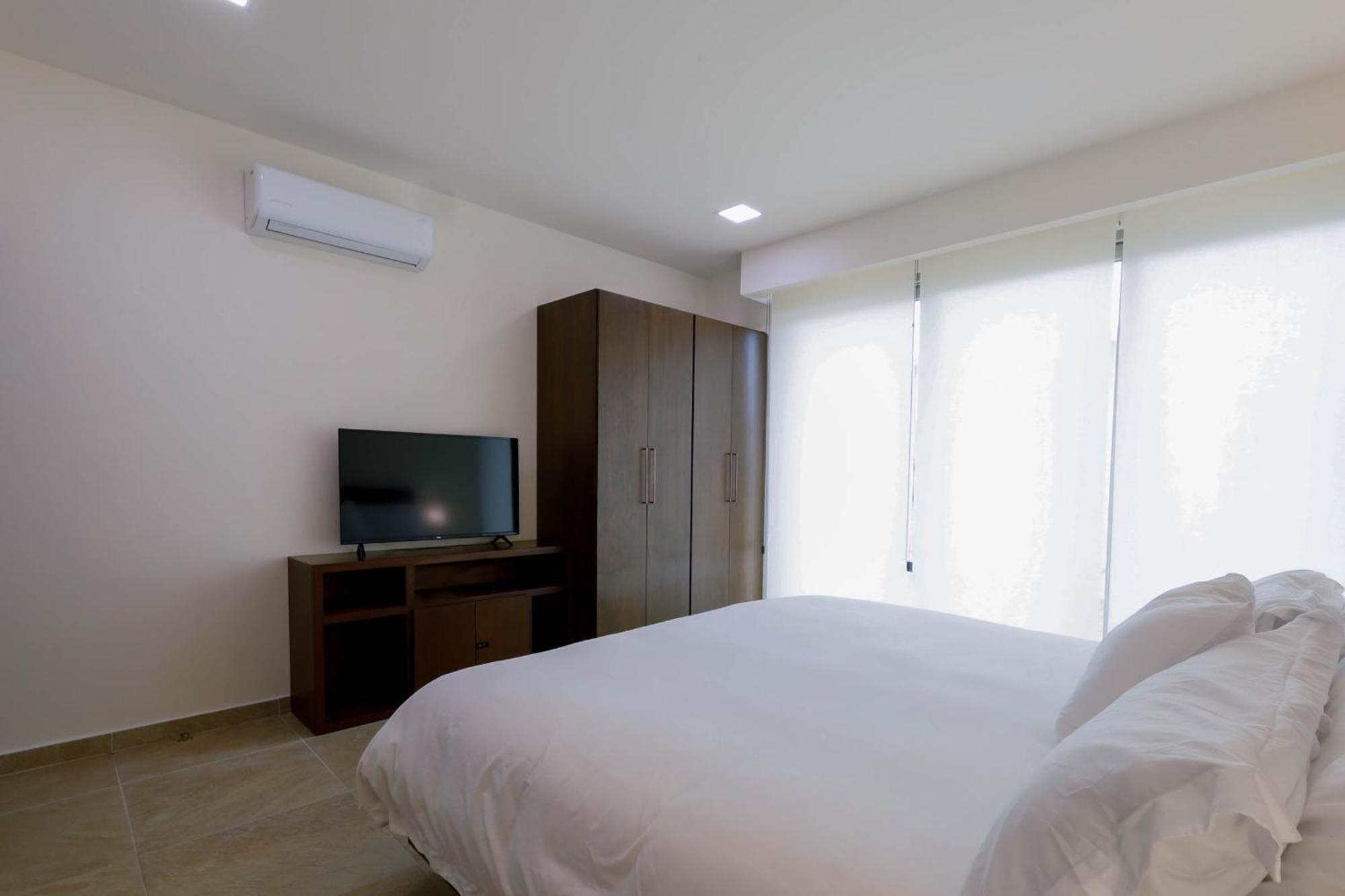 La Poza Suites อิสลามูเฮเรส ภายนอก รูปภาพ